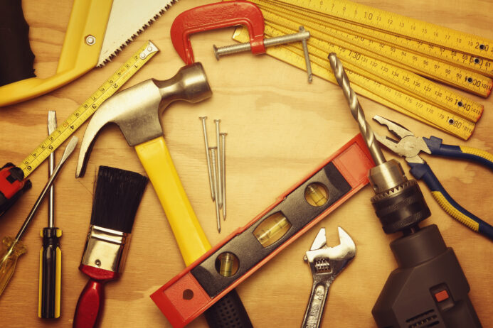 Assorted work tools on wood