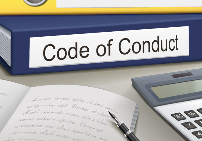 code of conduct binders isolated on the office table
