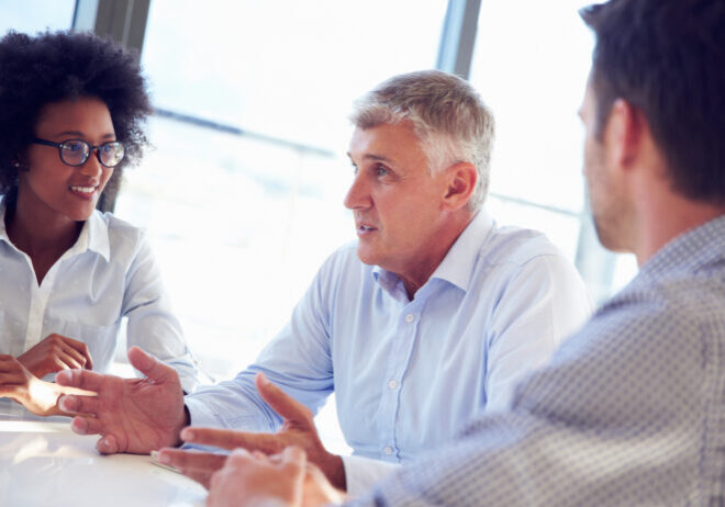 Three business professionals working together